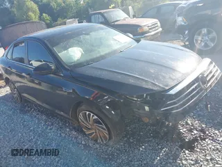 2020 Volkswagen Jetta SEL z VIN 3VWE57BU2LM093697, wystawiony jako IAAI lot #40437984 z przebiegiem 76 803 mil mil oraz . Historia ofert i sprzedaży dostępna na DreamBid. Obrazek 1.