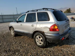 2003 Hyundai Santa Fe GLS with VIN KM8SC73D43U460083, listed as a Copart auction lot 70060594 with 0 mi miles and Salvage Title. Bid and sale history available at carsss.com. Image 2.