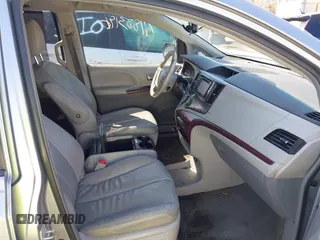 2013 Toyota Sienna XLE AAS with VIN 5TDYK3DC9DS304059, listed as a IAAI auction lot 41883196 with 170,842 mi miles and . Bid and sale history available at DreamBid. Image 5.
