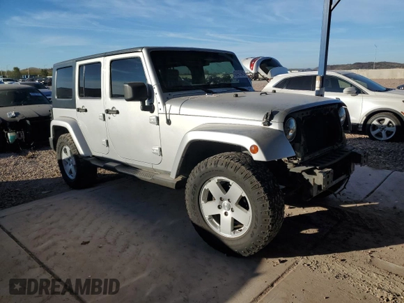 2010 Jeep Wrangler Unlimited Sahara with VIN 1J4HA5H13AL184449, listed as a Copart auction lot 43421945 with 176,725 mi miles and Salvage Title. Bid and sale history available at carsss.com. Image 4.
