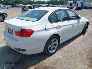 2015 BMW 3 Series 328i xDrive with VIN WBA3B5G56FNS15848, listed as a IAAI auction lot 42537645 with 121,742 mi miles and . Bid and sale history available at DreamBid. Image 4.