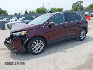 2019 Ford Edge Titanium with VIN 2FMPK4K96KBB20247, listed as a IAAI auction lot 42450212 with 121,756 mi miles and . Bid and sale history available at DreamBid. Image 2.