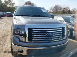 2011 Ford F-150 XLT with VIN 1FTFW1ET7BFC47792, listed as a IAAI auction lot 41765574 with 174,001 mi miles. Bid and sale history available at carsss.com. Image 12.
