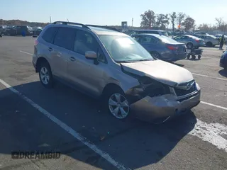 2015 Subaru Forester 2.5i Premium with VIN JF2SJADC4FH409078, listed as a IAAI auction lot 40731696 with 171,874 mi miles. Bid and sale history available at carsss.com. Image 1.
