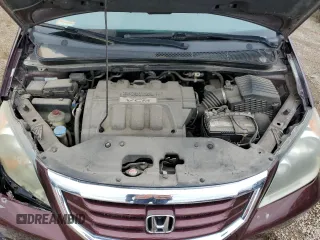 2010 Honda Odyssey Touring with VIN 5FNRL3H94AB056657, listed as a Copart auction lot 72658934 with 202,690 mi miles and Salvage title. Bid and sale history available at DreamBid. Image 12.