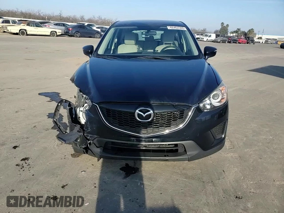 2015 Mazda CX-5 Sport z VIN JM3KE2BE6F0491107, wystawiony jako Copart lot #42462395 z przebiegiem 82 528 mil mil oraz Szkoda całkowita • Salvage title. Historia ofert i sprzedaży dostępna na DreamBid. Obrazek 11.
