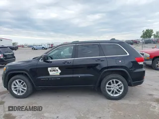 2018 Jeep Grand Cherokee Laredo E with VIN 1C4RJFAG6JC335606, listed as a IAAI auction lot 42280666 with 113,438 mi miles and . Bid and sale history available at DreamBid. Image 14.