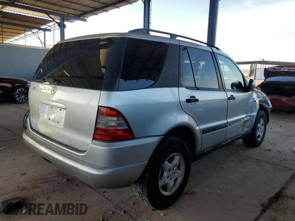 2000 Mercedes-Benz M-Class with VIN 4JGAB54E1YA193102, listed as a Copart auction lot 74294404 with 202,107 mi miles and Salvage Title. Bid and sale history available at carsss.com. Image 3.