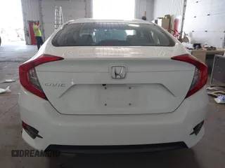 2017 Honda Civic LX with VIN 19XFC2F5XHE007668, listed as a IAAI auction lot 42219927 with 132,444 mi miles and . Bid and sale history available at DreamBid. Image 16.