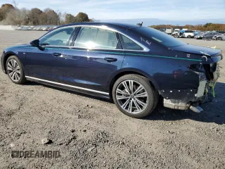 2023 Audi A8 with VIN WAULDAF86PN002950, listed as a Copart auction lot 77352374 with 4,444 mi miles and Salvage Title. Bid and sale history available at carsss.com. Image 2.