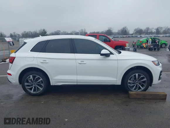 2021 Audi Q5 Premium Plus z VIN WA1BAAFY8M2077292, wystawiony jako IAAI lot #41663216 z przebiegiem 35 378 mil mil oraz . Historia ofert i sprzedaży dostępna na DreamBid. Obrazek 14.
