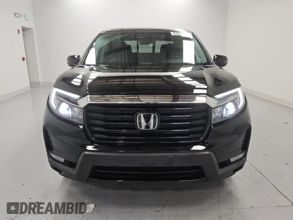 2023 Honda Ridgeline RTL-E with VIN 5FPYK3F79PB038896, listed as a Copart auction lot 58401225 with 23,531 mi miles and Clean title. Bid and sale history available at DreamBid. Image 5.