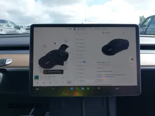 2022 Tesla Model Y Performance z VIN 7SAYGDEF9NF532880, wystawiony jako IAAI lot #41583671 z przebiegiem 38 057 mil mil oraz . Historia ofert i sprzedaży dostępna na DreamBid. Obrazek 19.