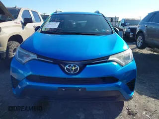 2016 Toyota RAV4 LE with VIN JTMBFREV2GD183811, listed as a IAAI auction lot 42216793 with 95,270 mi miles and . Bid and sale history available at DreamBid. Image 12.
