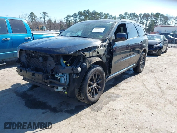 2015 Dodge Durango SXT with VIN 1C4RDJAG3FC695918, listed as a IAAI auction lot 41715629 with 143,460 mi miles and . Bid and sale history available at DreamBid. Image 17.