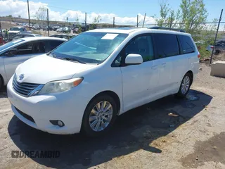 2011 Toyota Sienna XLE with VIN 5TDDK3DCXBS029961, listed as a IAAI auction lot 42228356 with 251,571 mi miles and . Bid and sale history available at DreamBid. Image 2.