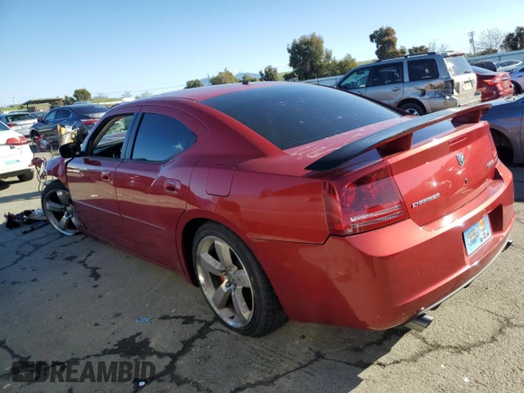 2006 Dodge Charger SRT-8 with VIN 2B3KA73W66H283699, listed as a Copart auction lot 44060975 with 126,105 mi miles and Salvage Title. Bid and sale history available at DreamBid. Image 2.