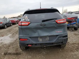 2014 Jeep Cherokee Trailhawk z VIN 1C4PJMBS8EW239981, wystawiony jako Copart lot #80226054 z przebiegiem 161 750 mil mil oraz Czysty tytuł • Clean title. Historia ofert i sprzedaży dostępna na DreamBid. Obrazek 6.