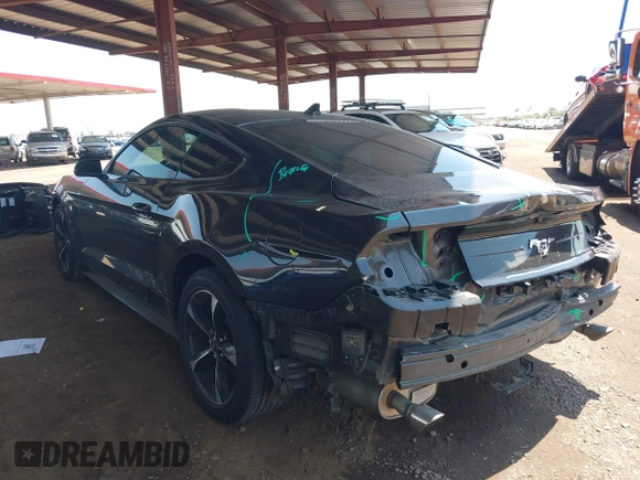2022 Ford Mustang EcoBoost with VIN 1FA6P8TH9N5109501, listed as a IAAI auction lot 42437964 with 56,895 mi miles and . Bid and sale history available at DreamBid. Image 3.