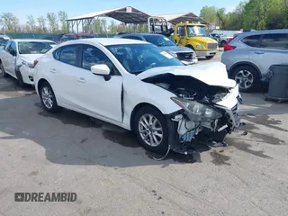 2014 Mazda 3 i Touring with VIN JM1BM1V78E1156409, listed as a IAAI auction lot 42039966 with 123,601 mi miles and . Bid and sale history available at DreamBid. Image 1.