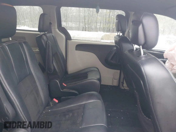 2014 Dodge Grand Caravan SXT with VIN 2C4RDGCG2ER463395, listed as a IAAI auction lot 41709948 with 137,783 mi miles and . Bid and sale history available at DreamBid. Image 8.