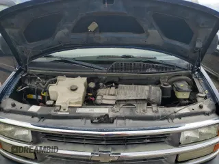 2001 Chevrolet Chevy Van z VIN 1GBFG15M411225075, wystawiony jako Copart lot #56948945 z przebiegiem 201 558 mil mil oraz Tytuł czysty. Historia ofert i sprzedaży dostępna na DreamBid. Obrazek 12.