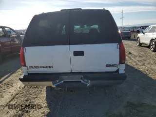 1998 GMC Suburban z VIN 1GKFK16R1WJ700312, wystawiony jako Copart lot #73160574 z przebiegiem 150 174 mil mil oraz Czysty tytuł • Clean title. Historia ofert i sprzedaży dostępna na DreamBid. Obrazek 6.