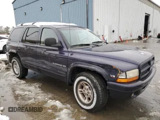 1999 Dodge Durango with VIN 1B4HS28Y3XF569044, listed as a Copart auction lot 44583815 with 70,682 mi miles and Salvage title. Bid and sale history available at DreamBid. Image 4.