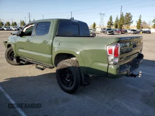 2021 Toyota Tacoma SR5 z VIN 3TMAZ5CN6MM157145, wystawiony jako Copart lot #51641085 z przebiegiem Nie podano mil oraz Szkoda całkowita • Salvage title. Historia ofert i sprzedaży dostępna na DreamBid. Obrazek 2.