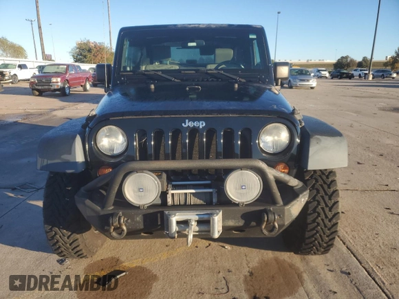 2010 Jeep Wrangler Rubicon with VIN 1J4BA6D10AL203265, listed as a Copart auction lot 79570754 with 114,840 mi miles and Salvage title. Bid and sale history available at DreamBid. Image 5.