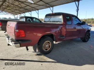 2003 Ford F-150 XL with VIN 1FTRX07L33KB73992, listed as a Copart auction lot 79565774 with 160,545 mi miles and Salvage title. Bid and sale history available at DreamBid. Image 3.