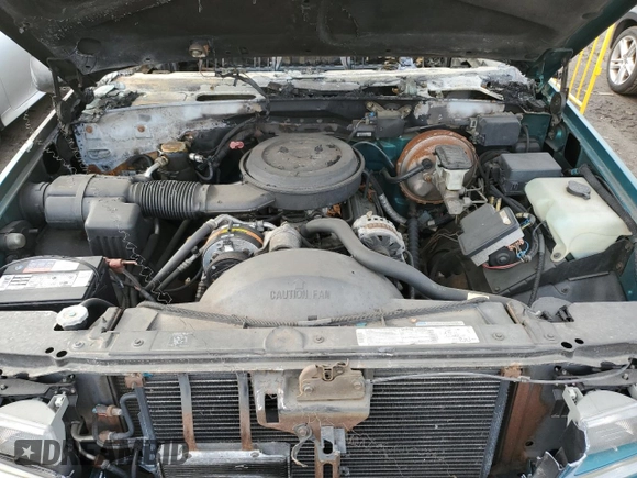 1995 GMC Sierra 1500 z VIN 2GTEK19K0S1570324, wystawiony jako Copart lot #43065205 z przebiegiem Nie podano mil oraz Szkody całkowita. Historia ofert i sprzedaży dostępna na DreamBid. Obrazek 11.