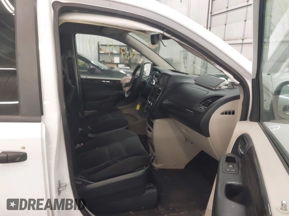 2020 Dodge Grand Caravan SE with VIN 2C4RDGBG4LR168233, listed as a IAAI auction lot 41680974 with 62,765 mi miles and . Bid and sale history available at DreamBid. Image 5.