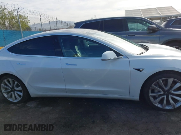 2020 Tesla Model 3 Long Range with VIN 5YJ3E1EB9LF620771, listed as a IAAI auction lot 41795008 with 53,155 mi miles and . Bid and sale history available at DreamBid. Image 13.
