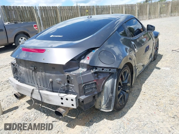2010 Nissan 370Z Touring z VIN JN1AZ4EH1AM502464, wystawiony jako IAAI lot #42180616 z przebiegiem 145 598 mil mil oraz . Historia ofert i sprzedaży dostępna na DreamBid. Obrazek 4.