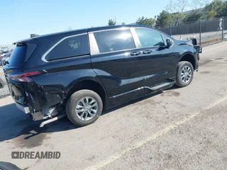 2023 Toyota Sienna LE with VIN 5TDKRKEC6PS142714, listed as a IAAI auction lot 41641382 with 5,699 mi miles. Bid and sale history available at carsss.com. Image 4.