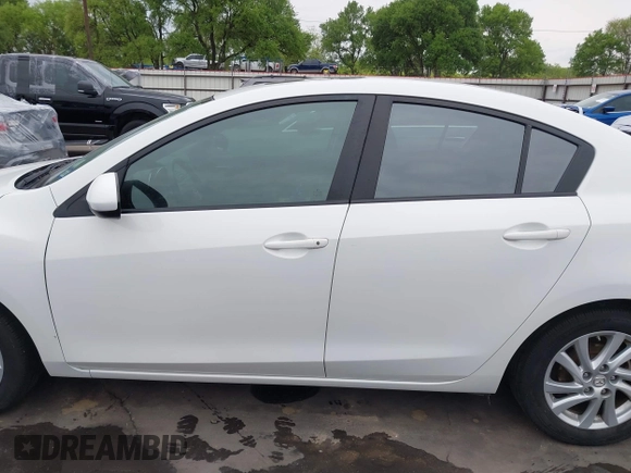 2012 Mazda Mazda3 i Touring with VIN JM1BL1V74C1694444, listed as a IAAI auction lot 41879335 with 123,020 mi miles. Bid and sale history available at carsss.com. Image 14.
