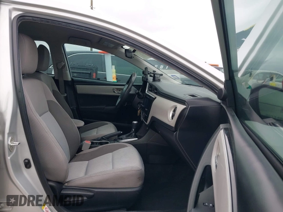 2018 Toyota Corolla L z VIN 5YFBURHE7JP822870, wystawiony jako IAAI lot #42318344 z przebiegiem 118 519 mil mil oraz . Historia ofert i sprzedaży dostępna na DreamBid. Obrazek 5.