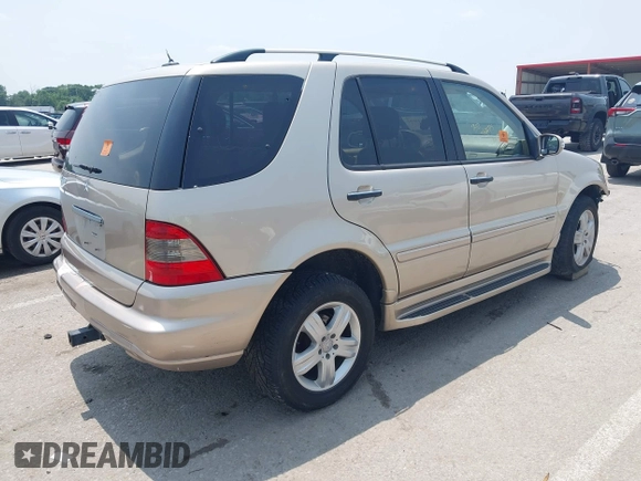 2005 Mercedes-Benz M 350 with VIN 4JGAB57E75A557255, listed as a IAAI auction lot 42443892 with 199,968 mi miles and . Bid and sale history available at DreamBid. Image 4.