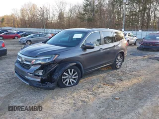 2019 Honda Pilot EX-L z VIN 5FNYF5H5XKB026513, wystawiony jako IAAI lot #41269623 z przebiegiem 62 372 mil mil oraz . Historia ofert i sprzedaży dostępna na DreamBid. Obrazek 2.