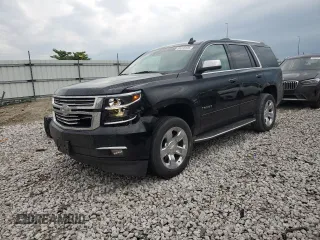 2016 Chevrolet Tahoe LTZ with VIN 1GNSKCKC0GR332108, listed as a Copart auction lot 59316135 with 128,712 mi miles and Salvage title. Bid and sale history available at DreamBid. Image 1.