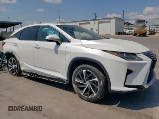2017 Lexus RX 450h with VIN 2T2BGMCAXHC010399, listed as a Copart auction lot 53464995 with 32,530 mi miles and Salvage Title. Bid and sale history available at DreamBid. Image 4.