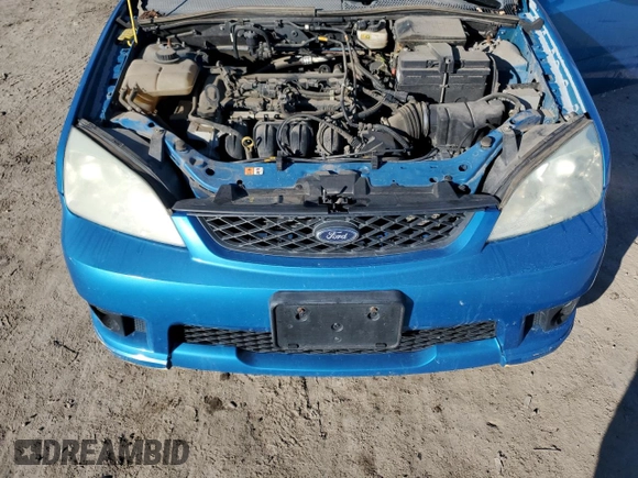 2007 Ford Focus S z VIN 1FAFP31N77W244856, wystawiony jako Copart lot #88972705 z przebiegiem Nie podano mil oraz Szkoda całkowita • Salvage title. Historia ofert i sprzedaży dostępna na DreamBid. Obrazek 12.