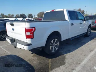 2019 Ford F-150 XL with VIN 1FTEW1C59KKE70231, listed as a IAAI auction lot 41992437 with 58,600 mi miles and . Bid and sale history available at DreamBid. Image 4.