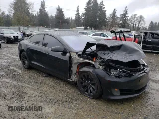 2016 Tesla Model S 70 with VIN 5YJSA1E16GF148517, listed as a Copart auction lot 52163195 with 179,172 mi miles and Salvage title. Bid and sale history available at DreamBid. Image 4.