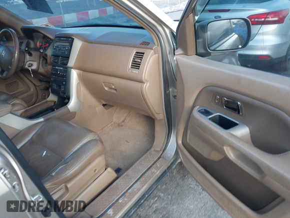 2007 Honda Pilot EX-L with VIN 2HKYF18667H509331, listed as a IAAI auction lot 41453510 with 228,746 mi miles and . Bid and sale history available at DreamBid. Image 5.