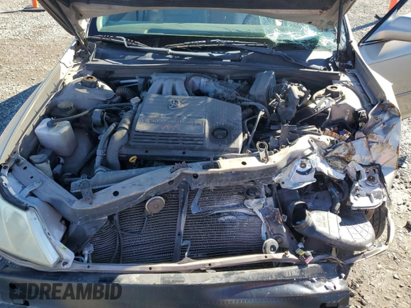 2000 Toyota Avalon XL z VIN 4T1BF28BXYU105489, wystawiony jako Copart lot #81673224 z przebiegiem 139 449 mil mil oraz Szkoda całkowita • Salvage title. Historia ofert i sprzedaży dostępna na DreamBid. Obrazek 13.