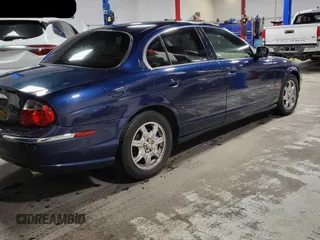 2000 Jaguar S-Type V8 z VIN SAJDA01D3YGL47987, wystawiony jako Copart lot #60103145 z przebiegiem 110 742 mil mil oraz Czysty tytuł • Clean title. Historia ofert i sprzedaży dostępna na DreamBid. Obrazek 4.