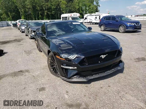 2018 Ford Mustang GT z VIN 1FA6P8CF5J5135182, wystawiony jako Copart lot #55926915 z przebiegiem 18 469 mil mil oraz Szkoda całkowita • Salvage title. Historia ofert i sprzedaży dostępna na DreamBid. Obrazek 13.