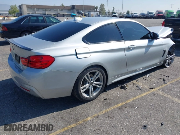 2014 BMW 4 Series 428i xDrive with VIN WBA3N9C54EF721188, listed as a IAAI auction lot 42143305 with Not provided miles and . Bid and sale history available at DreamBid. Image 4.